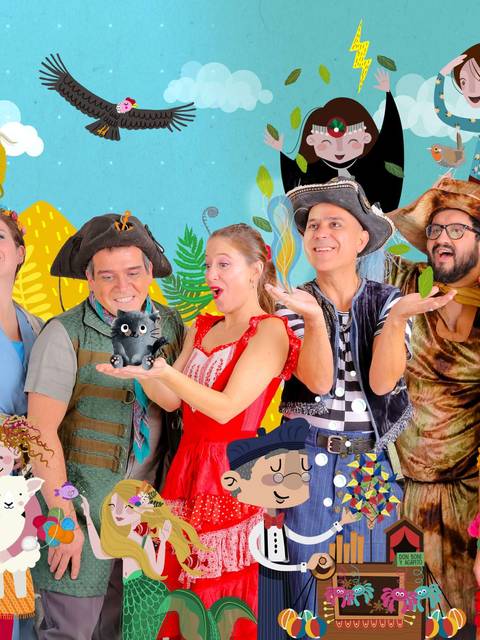 Un grupo de personas disfrazadas posando alegremente frente a un fondo colorido y festivo.