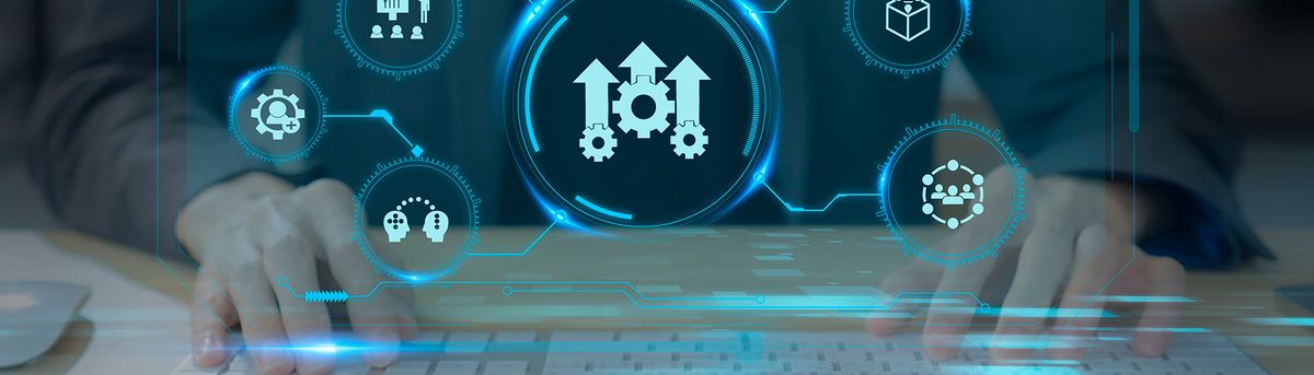 Una persona está usando un teclado mientras se visualizan iconos tecnológicos en una pantalla virtual.