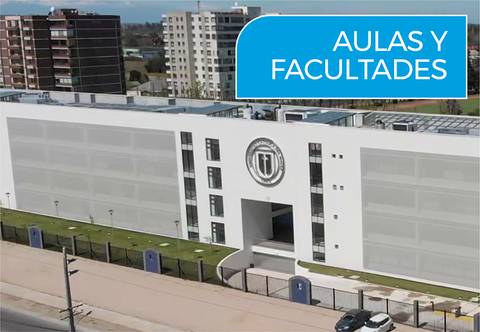 Edificio moderno que alberga aulas y facultades educativas.