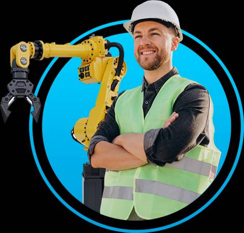 Un hombre sonriente en un chaleco reflectante frente a un robot industrial.