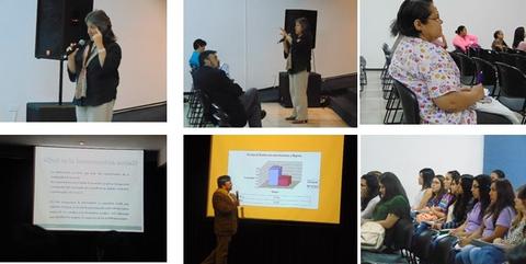 Una presentación en un evento educativo con diferentes ponentes y asistentes en el auditorio.
