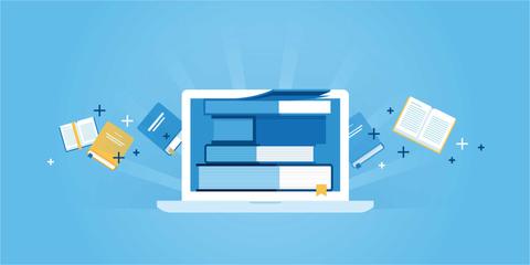 Una computadora portátil rodeada de libros y materiales de estudio en un fondo azul.