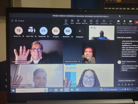 La imagen muestra una videoconferencia con varios participantes saludando frente a sus pantallas.