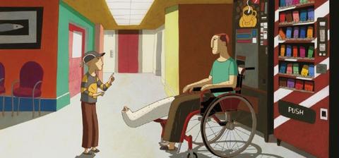 Un niño conversa con un adulto en una silla de ruedas en un pasillo colorido.