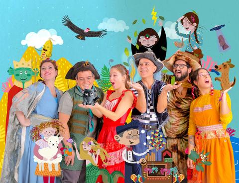 Grupo de personas vestidas con trajes coloridos posando alegremente frente a un fondo alegre y artístico.