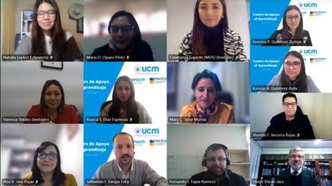 Reunión virtual de un grupo de profesionales en un entorno educativo.